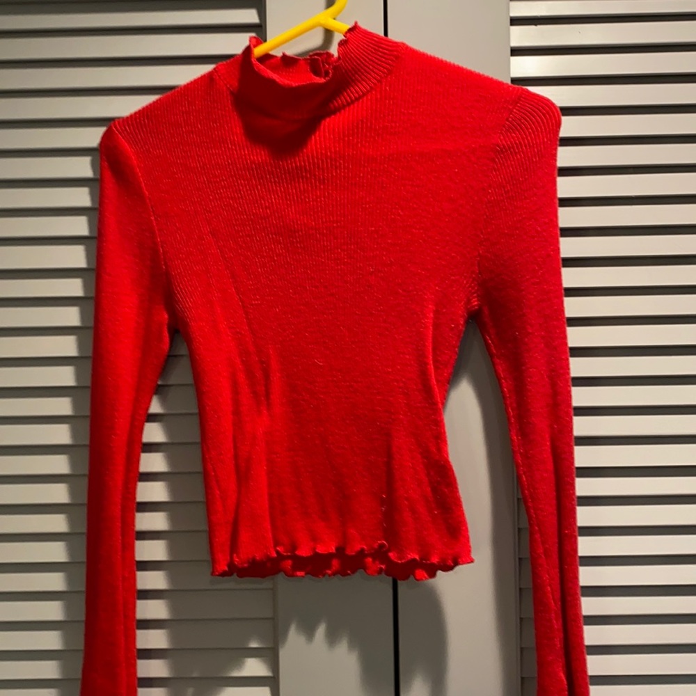 Ruffled red sweater
